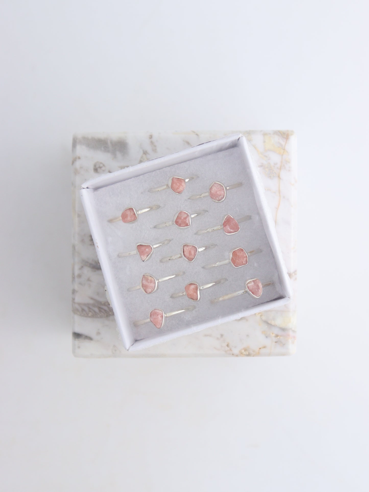 Rhodochrosite Rings Box of 12 - Mi Esperanza Minerals