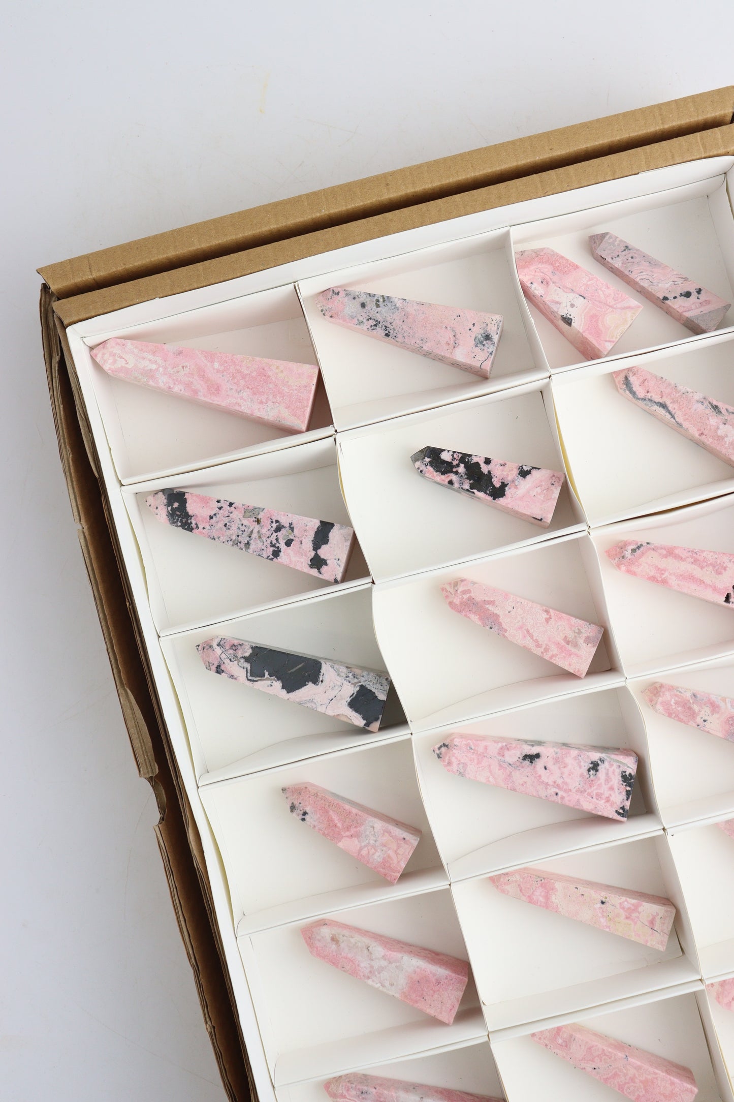 Rhodonite Towers - Expert Supplier of Wholesale Crystals & Bulk Gemstones