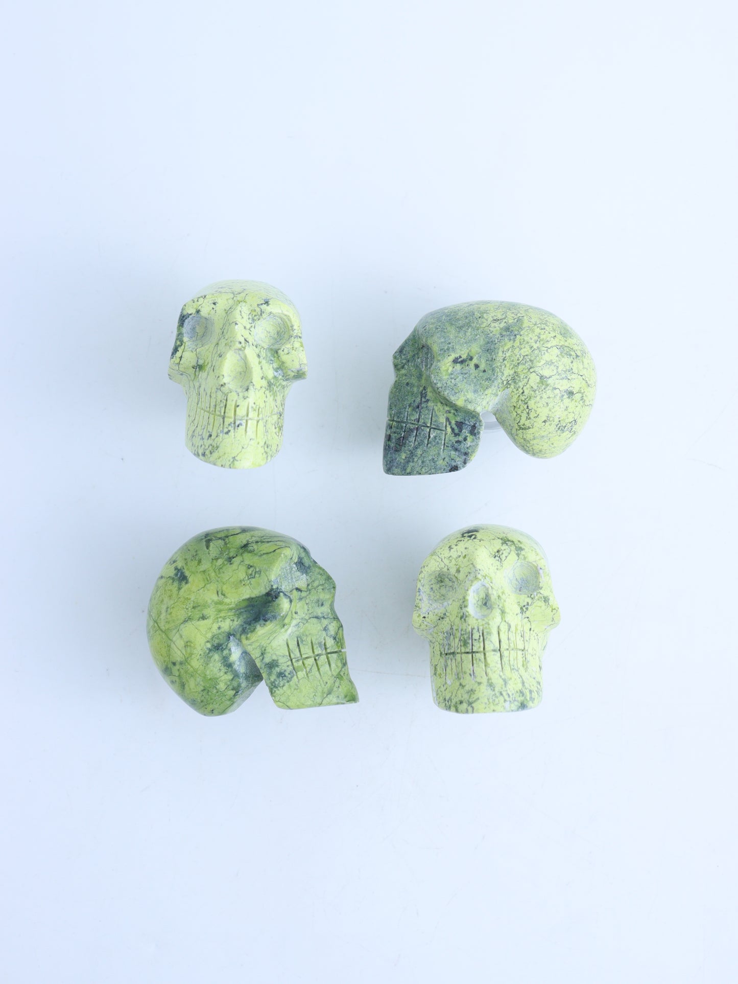 Serpentine Skulls - Expert Wholesale and Supplier of Wholesale Crystals & Bulk Gemstones, ["Mixed Carvings","serpentine"]