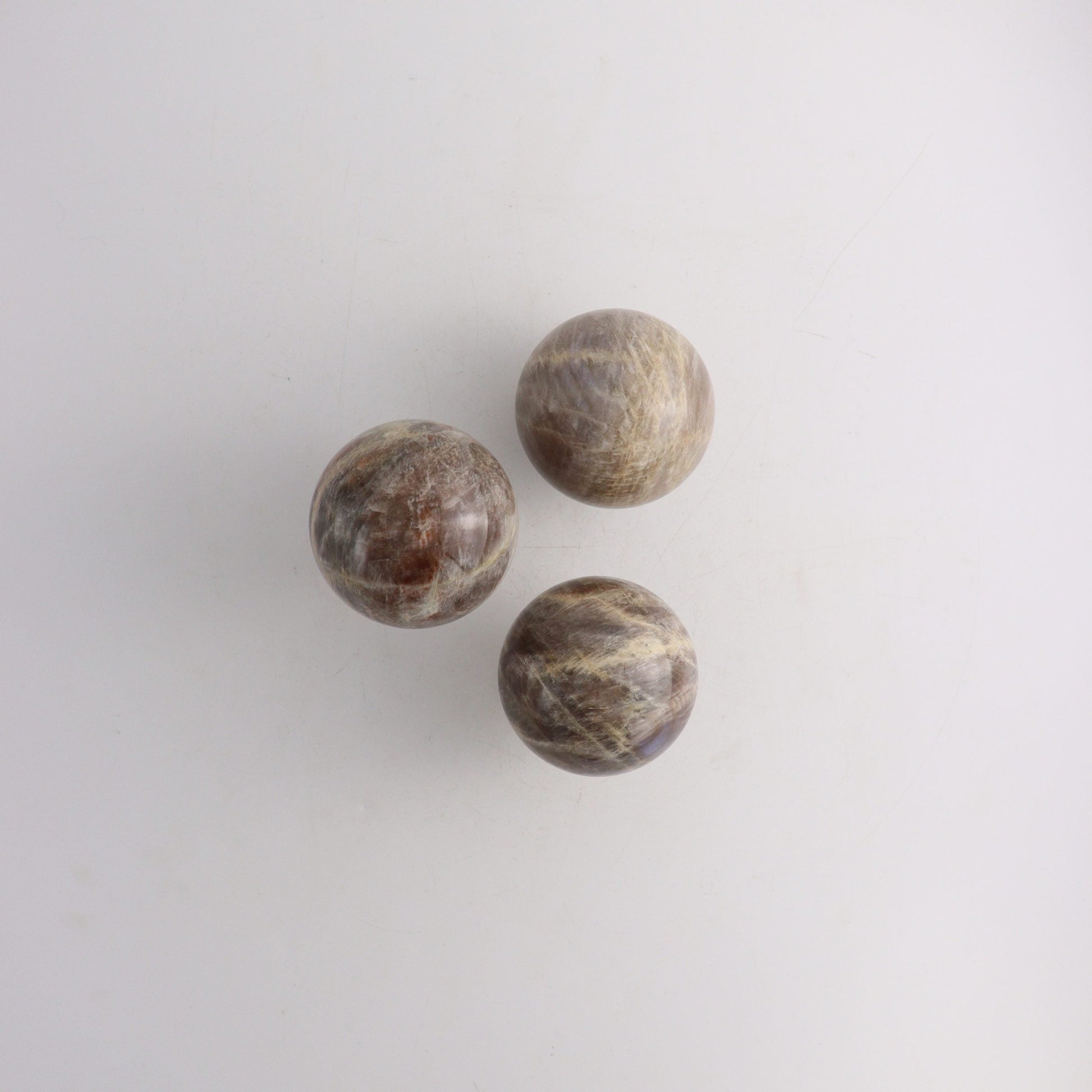 Sunstone Moonstone Spheres - Expert Vendor of Wholesale Crystals