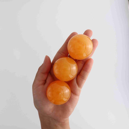 ONE Orange Calcite Sphere - Expert Vendor of Wholesale Crystals