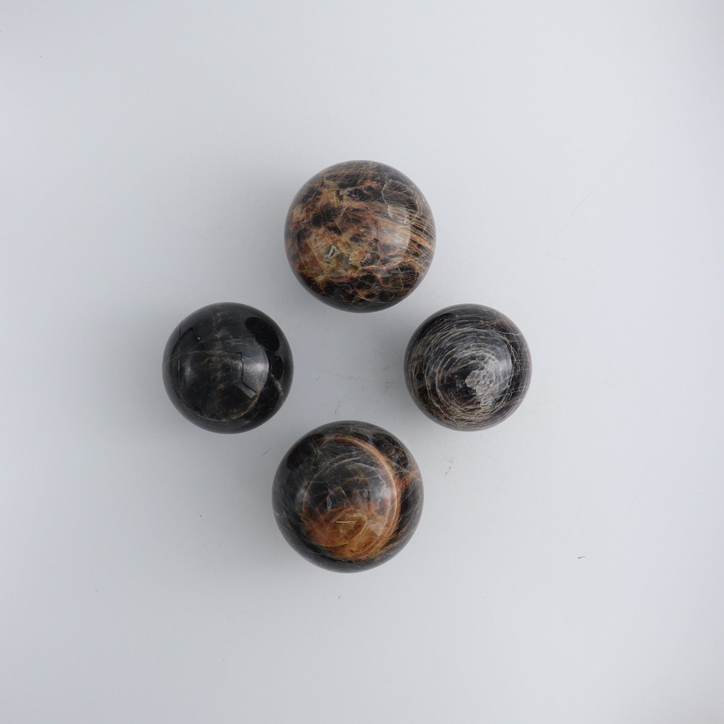 Black Moonstone Spheres C - Expert Wholesale and Supplier of Wholesale Crystals & Bulk Gemstones, ["Black Moonstone","Madagascar","Spheres"]