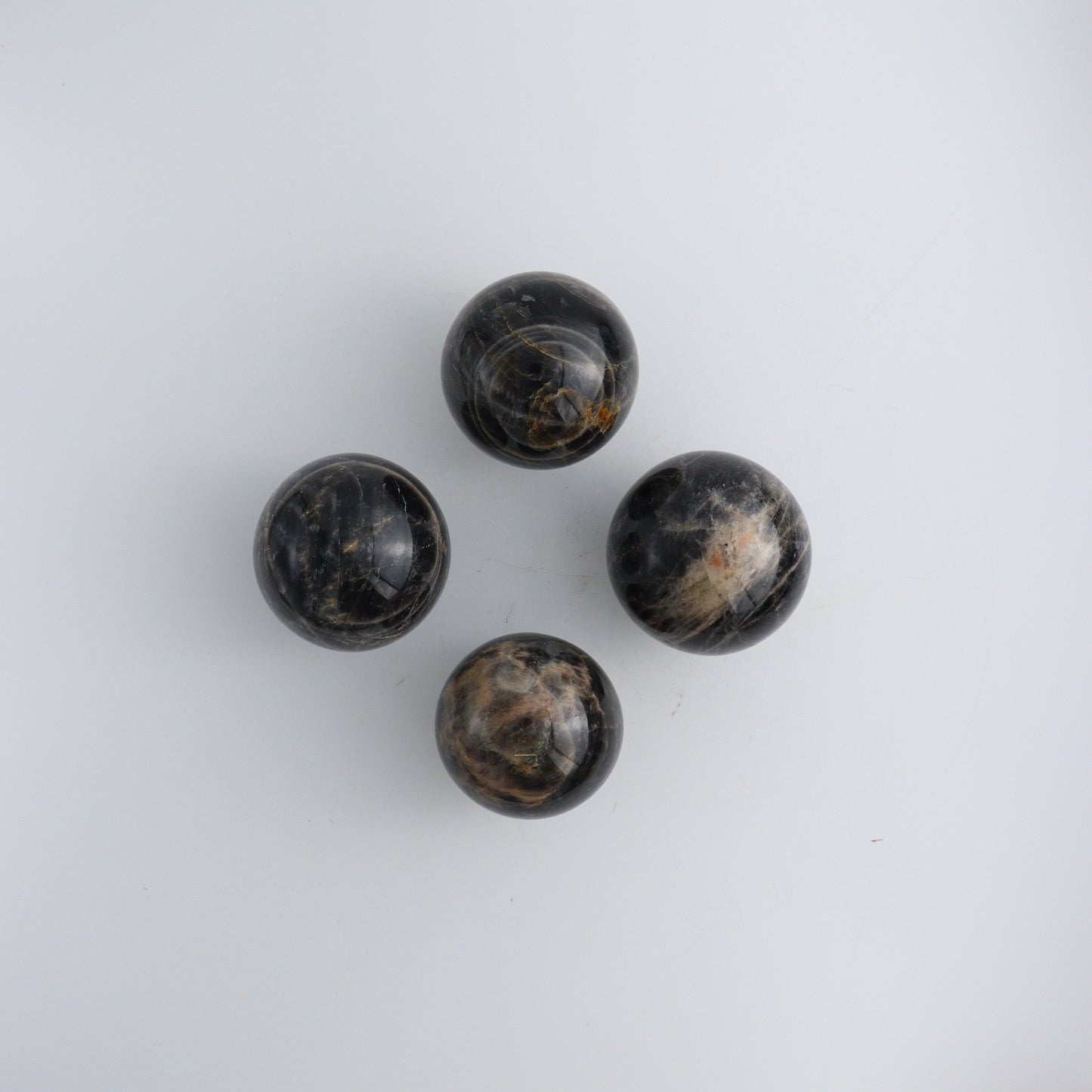 Black Moonstone Spheres D - Expert Wholesale and Supplier of Wholesale Crystals & Bulk Gemstones, ["Black Moonstone","Madagascar","Spheres"]