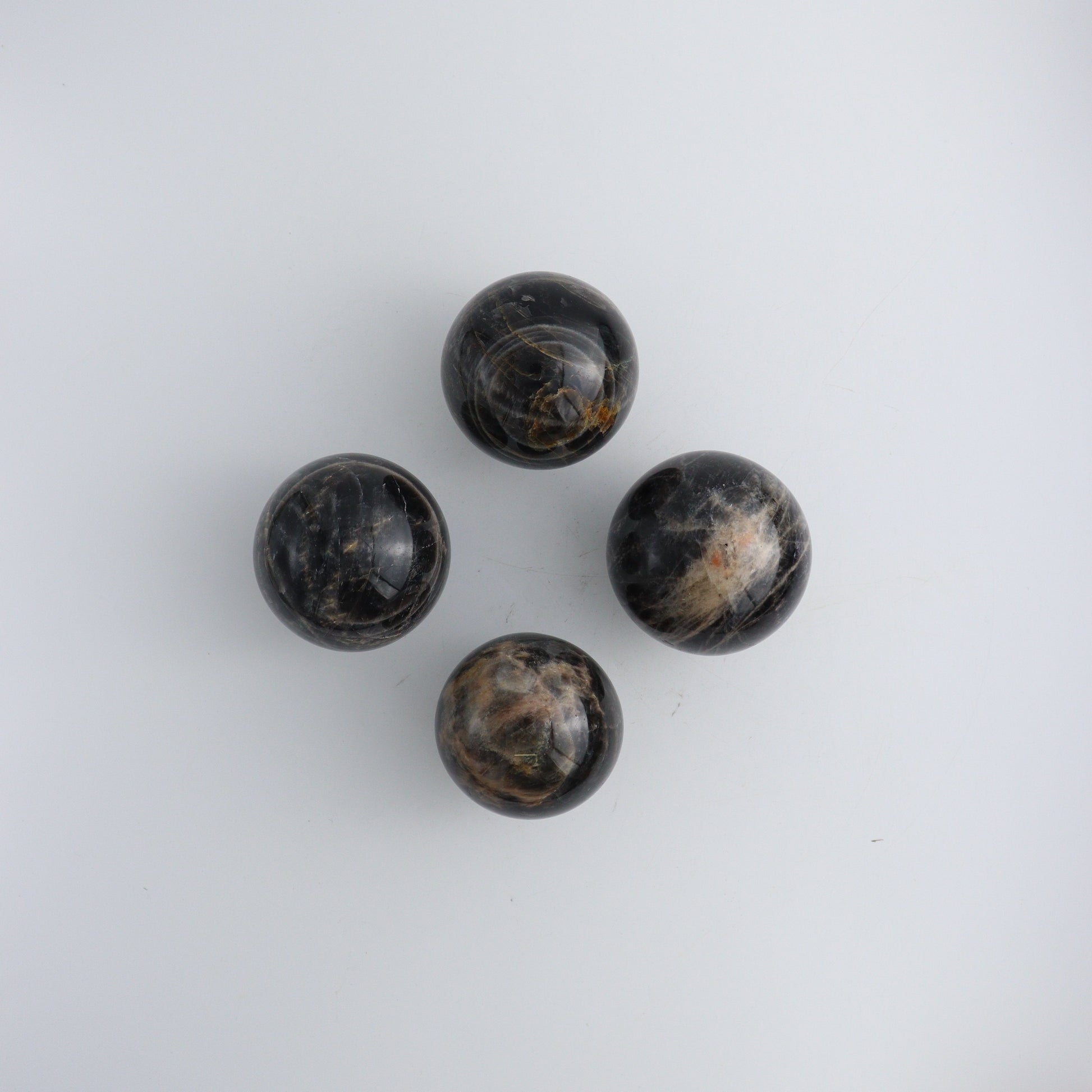 Black Moonstone Spheres D - Expert Wholesale and Supplier of Wholesale Crystals & Bulk Gemstones, ["Black Moonstone","Madagascar","Spheres"]