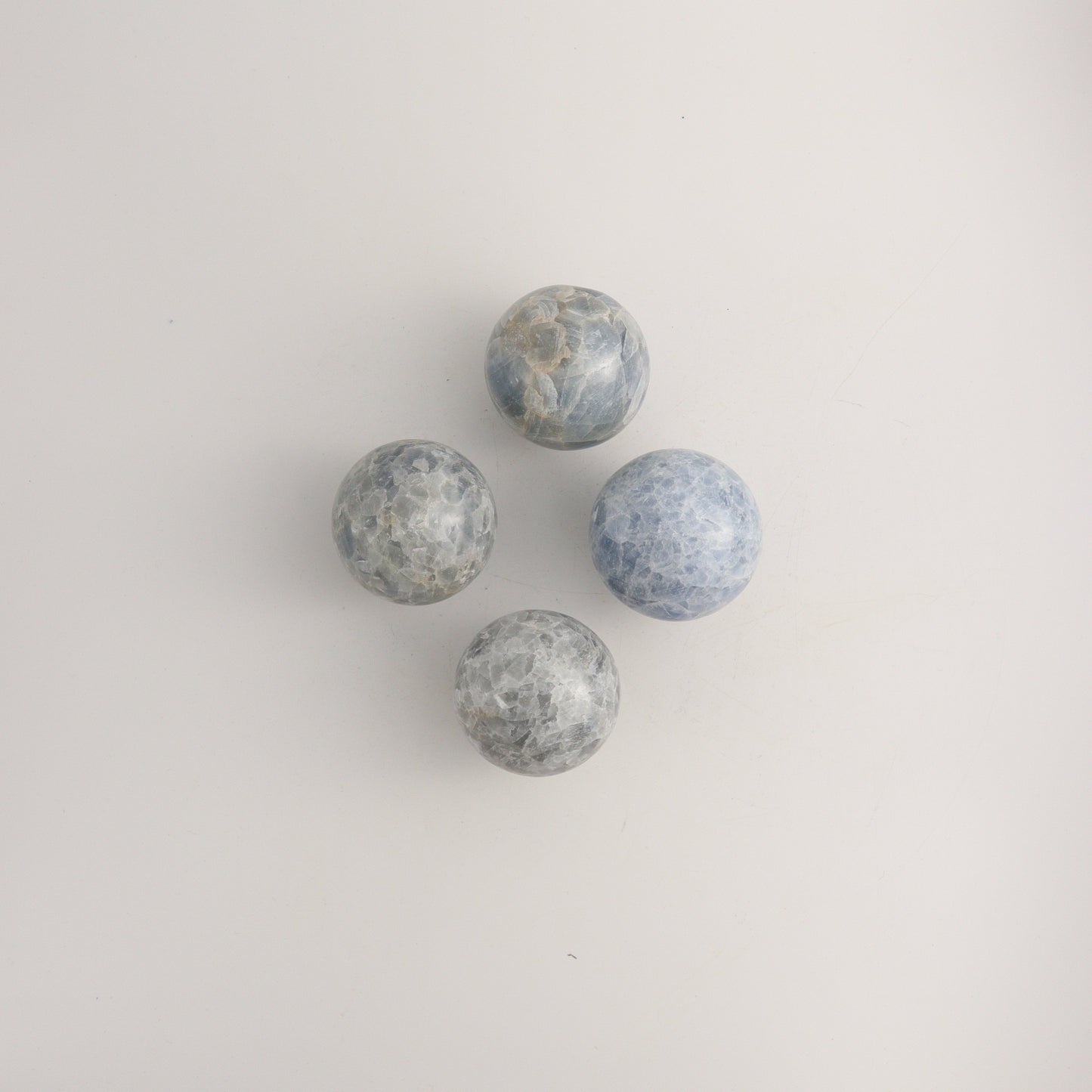 Blue Calcite Spheres C - Expert Wholesale and Supplier of Wholesale Crystals & Bulk Gemstones, ["Calcite","Mexico","Spheres"]