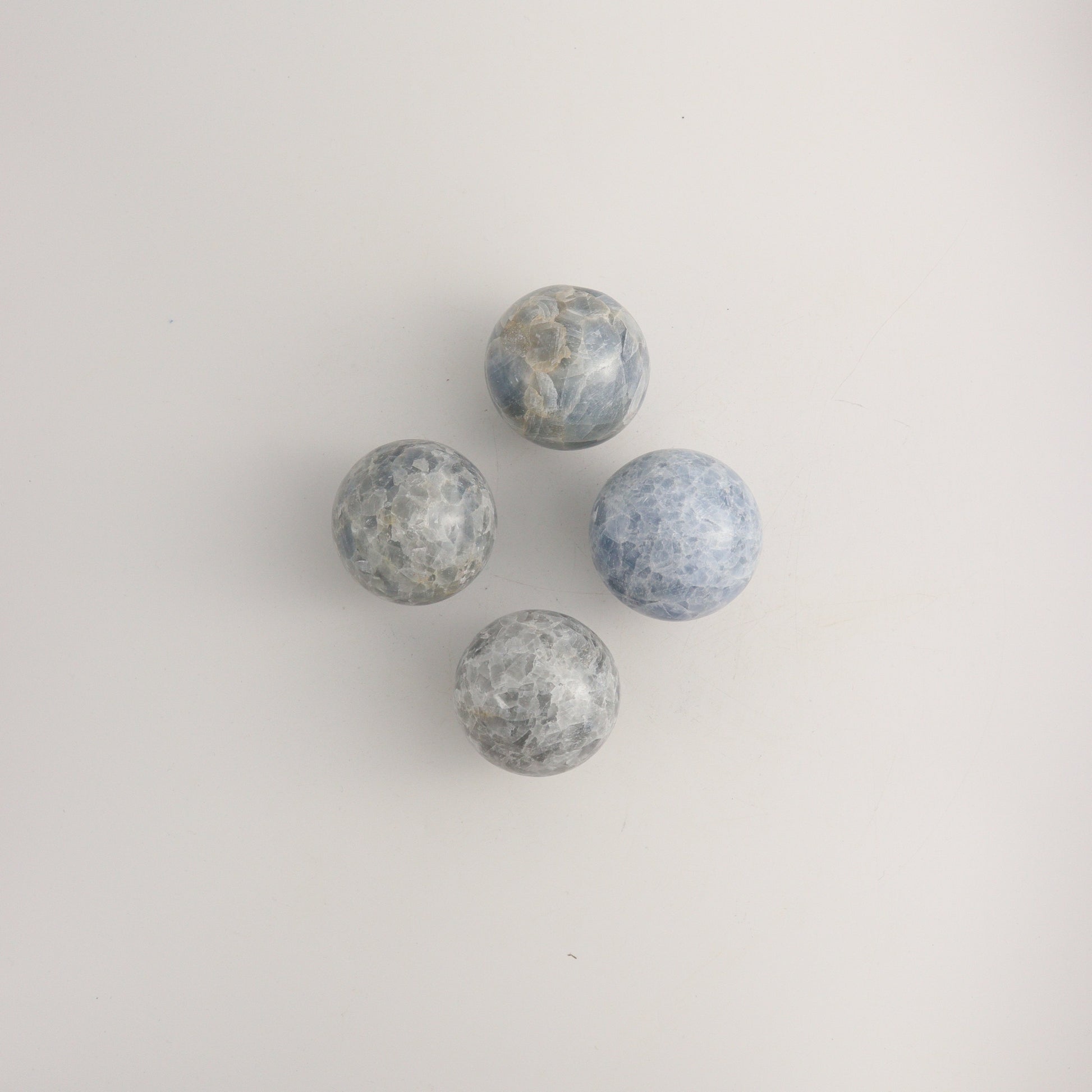 Blue Calcite Spheres C - Expert Wholesale and Supplier of Wholesale Crystals & Bulk Gemstones, ["Calcite","Mexico","Spheres"]