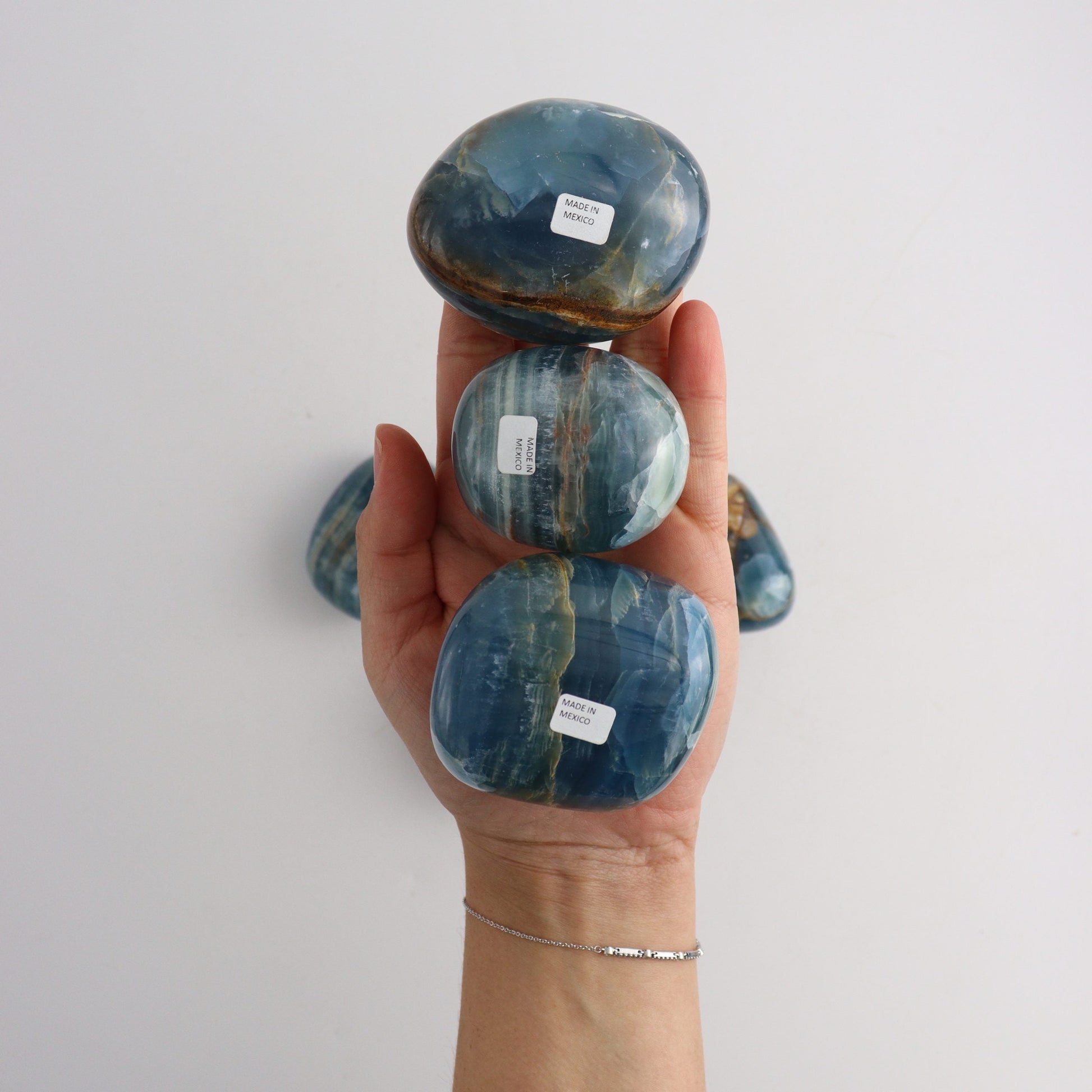 Blue Onyx Pebbles - Expert Wholesale and Supplier of Wholesale Crystals & Bulk Gemstones, ["Freeforms","Mexico","Onyx"]