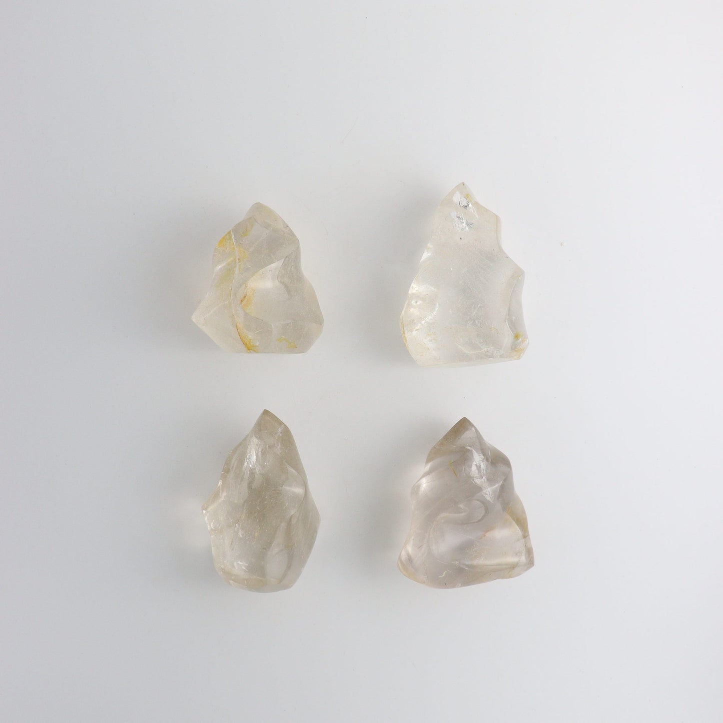 Clear Quartz Flames - Expert Wholesale and Supplier of Wholesale Crystals & Bulk Gemstones, ["Brazil","Clear Quartz","Freeforms","Mixed Carvings","Quartz","You will receive exact pieces shown in the pictures."]
