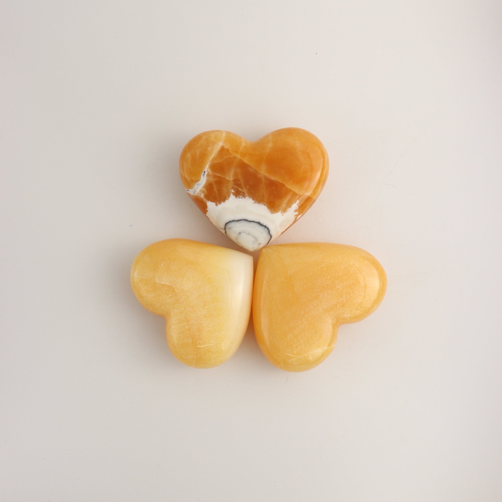 Orange Calcite Hearts A - Expert Wholesale and Supplier of Wholesale Crystals & Bulk Gemstones, ["Calcite","Hearts","Mexico"]