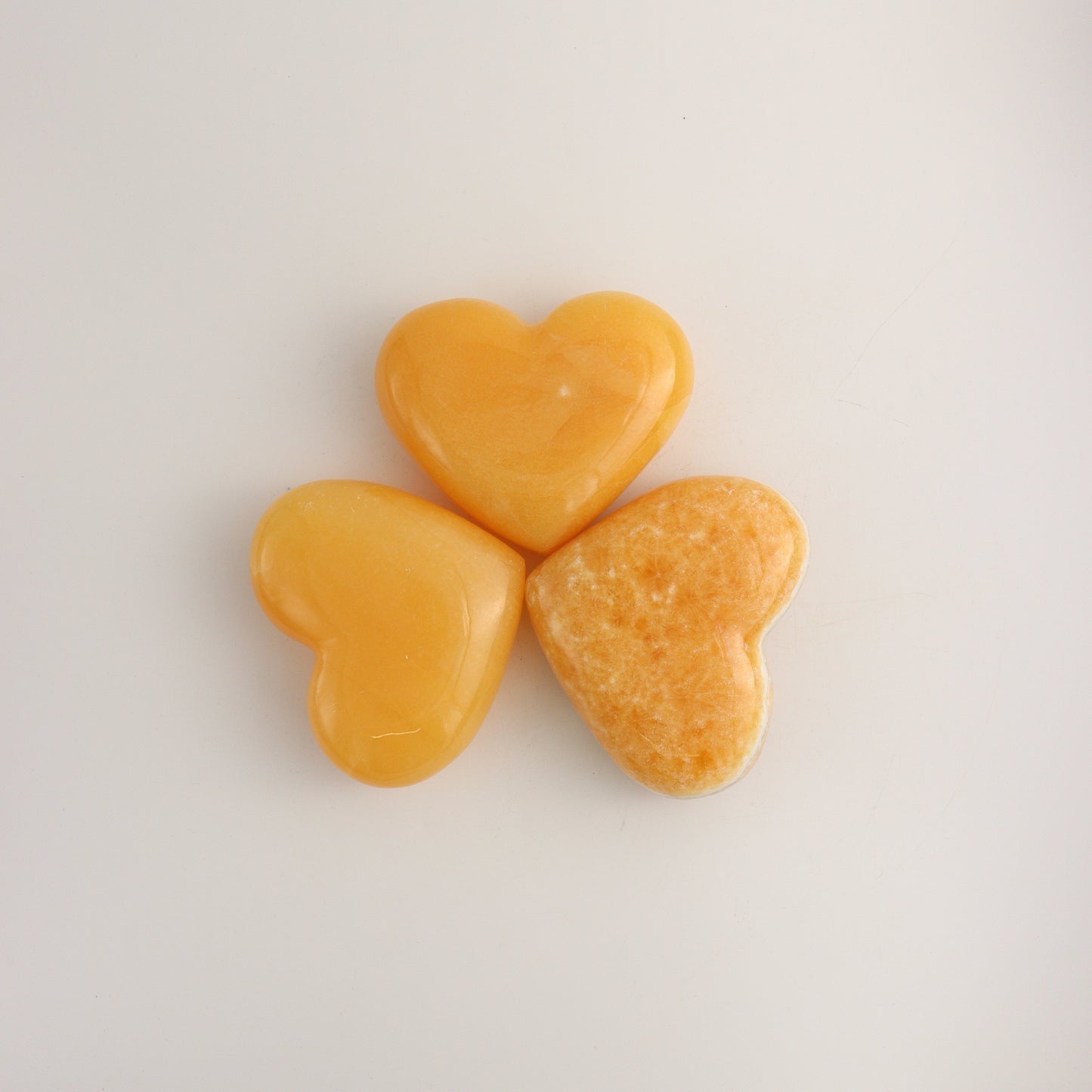 Orange Calcite Hearts B - Expert Wholesale and Supplier of Wholesale Crystals & Bulk Gemstones, ["Calcite","Hearts","Mexico"]