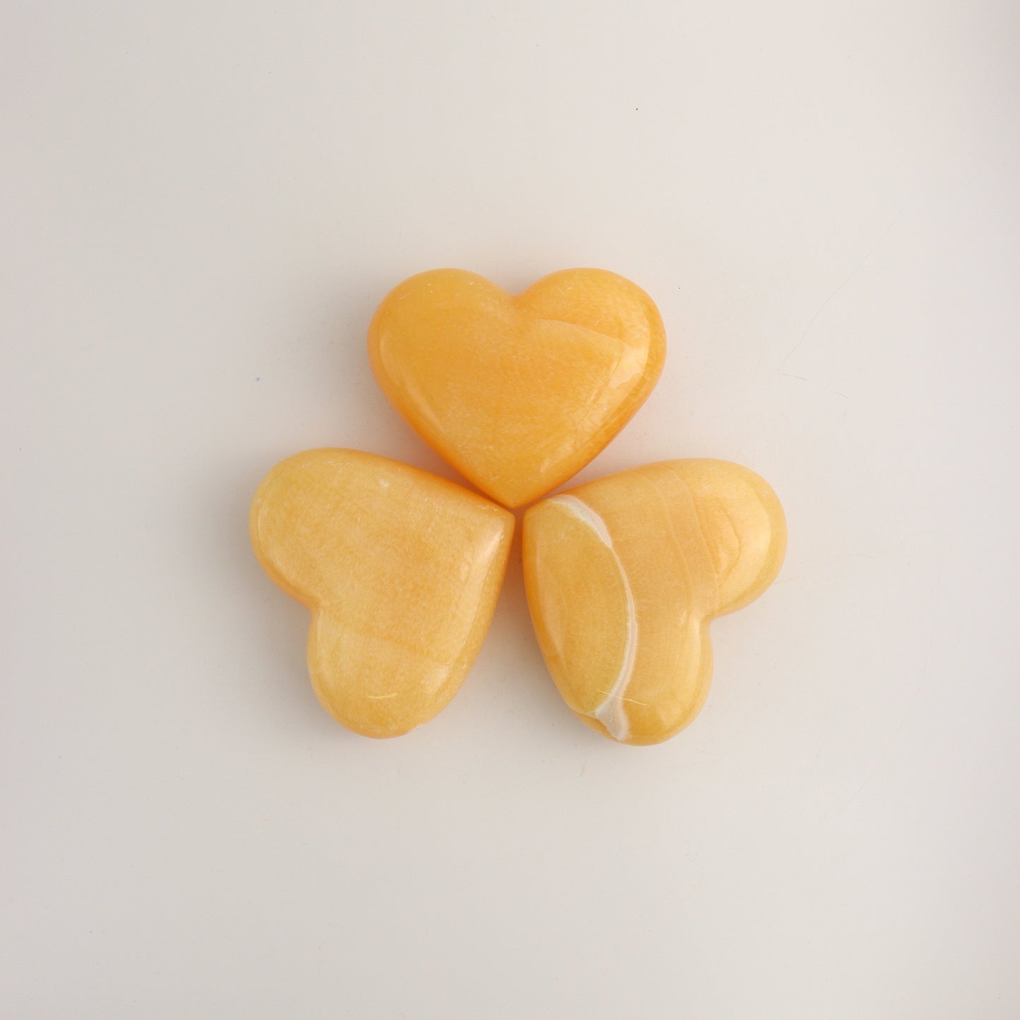 Orange Calcite Hearts C - Expert Wholesale and Supplier of Wholesale Crystals & Bulk Gemstones, ["Calcite","Hearts","Mexico"]