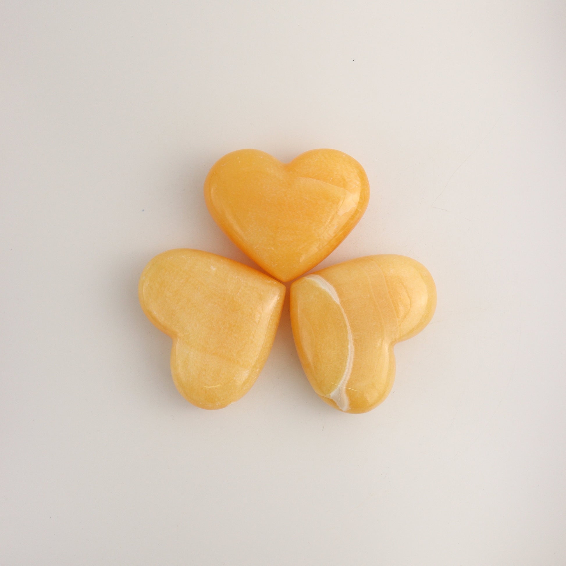Orange Calcite Hearts C - Expert Wholesale and Supplier of Wholesale Crystals & Bulk Gemstones, ["Calcite","Hearts","Mexico"]