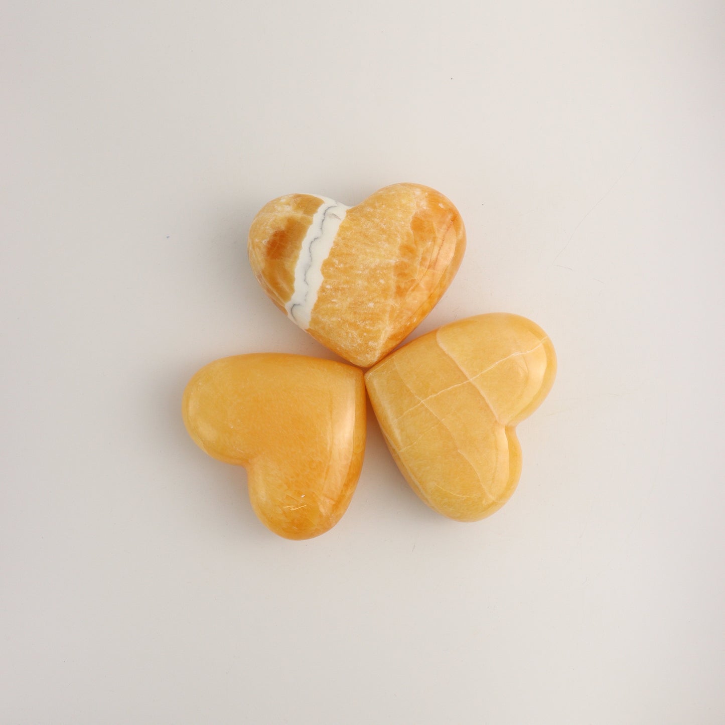 Orange Calcite Hearts D - Expert Wholesale and Supplier of Wholesale Crystals & Bulk Gemstones, ["Calcite","Hearts","Mexico"]