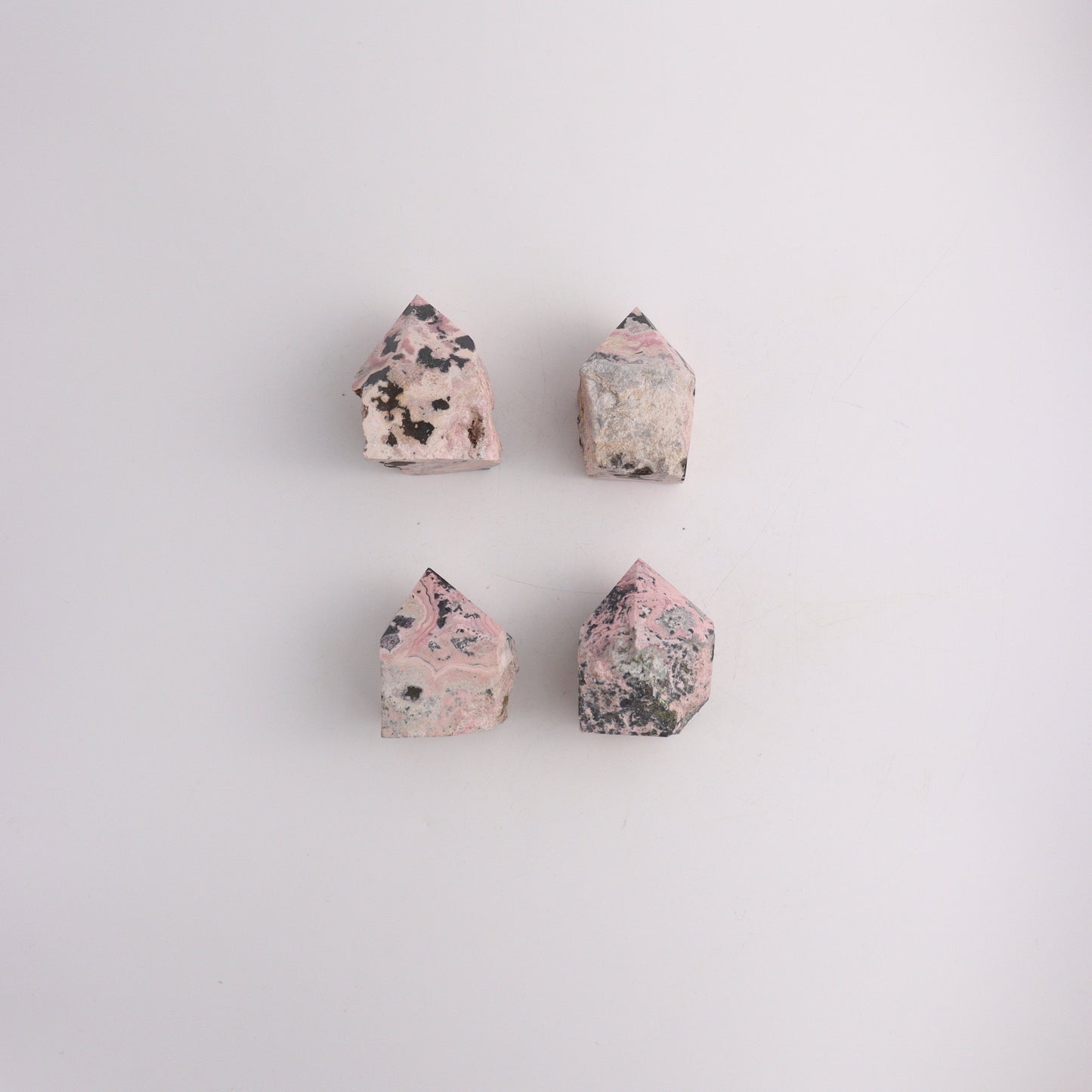 Rhodonite Polished Tip - Expert Wholesale and Supplier of Wholesale Crystals & Bulk Gemstones, ["Peru","Polished Tip"]
