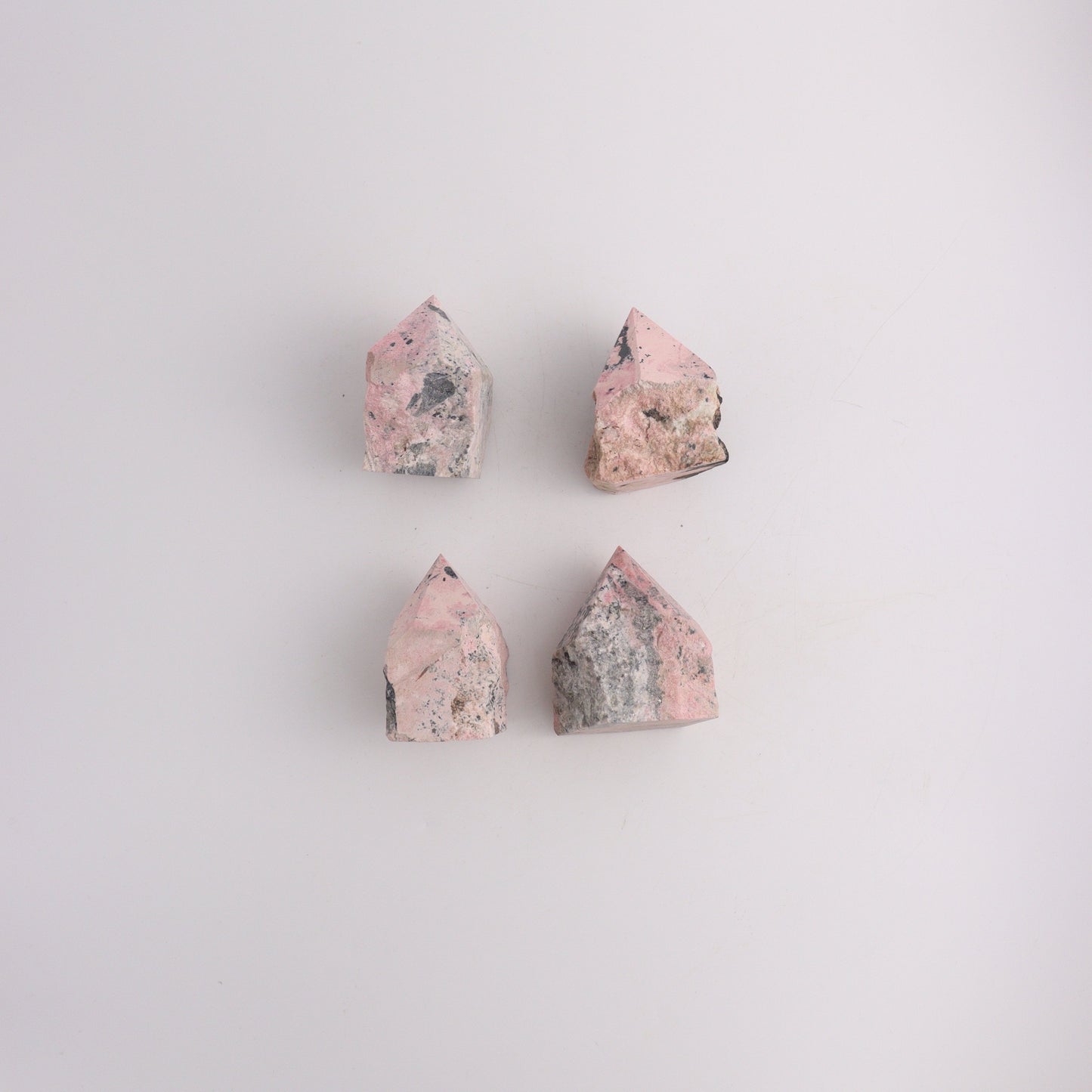 Rhodonite Polished Tip - Expert Wholesale and Supplier of Wholesale Crystals & Bulk Gemstones, ["Peru","Polished Tip"]