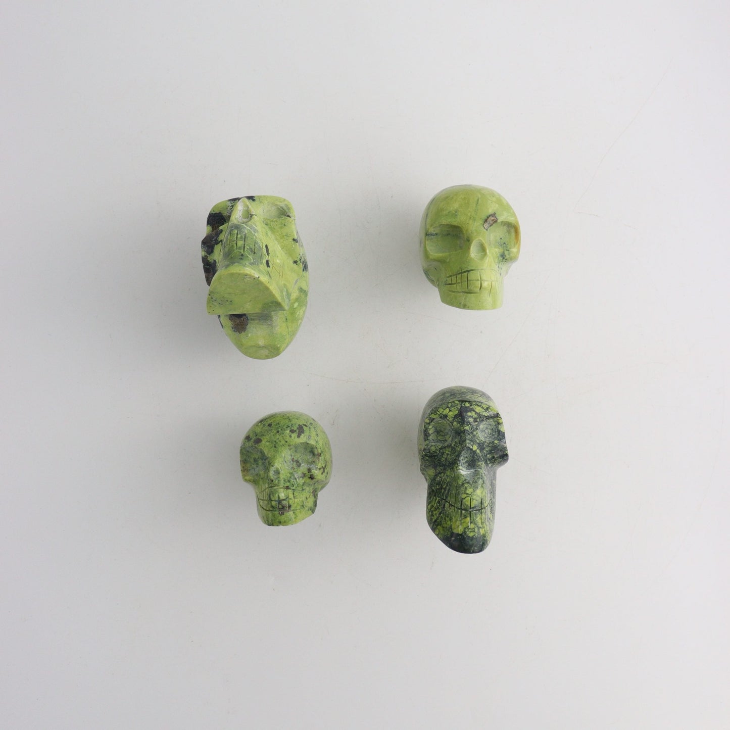 Serpentine Skulls - Expert Wholesale and Supplier of Wholesale Crystals & Bulk Gemstones, ["Mixed Carvings","Peru"]