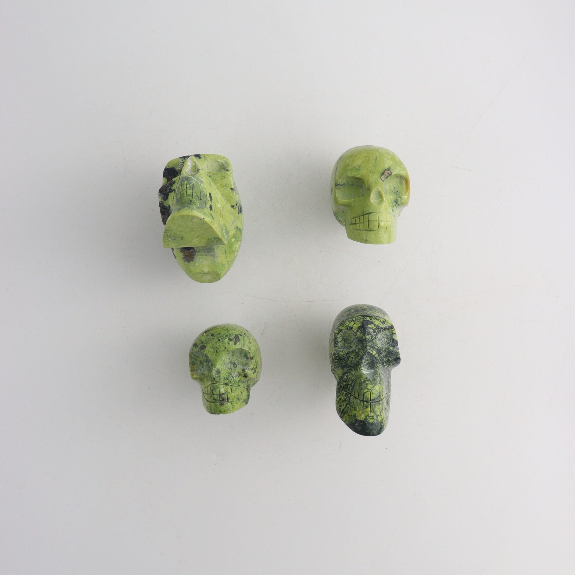Serpentine Skulls - Expert Wholesale and Supplier of Wholesale Crystals & Bulk Gemstones, ["Mixed Carvings","Peru"]
