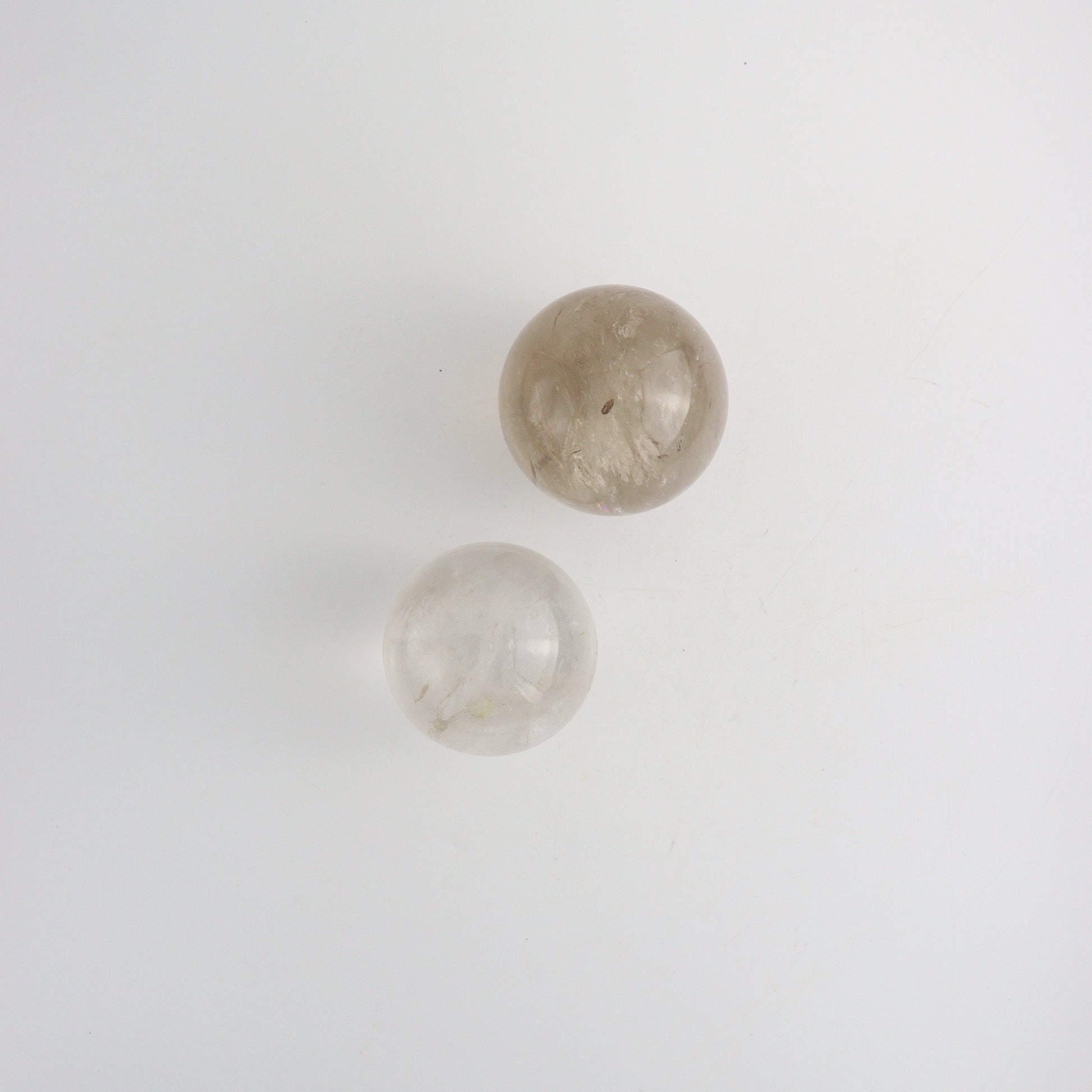 Smoky and Clear Quartz Spheres - Expert Wholesale and Supplier of Wholesale Crystals & Bulk Gemstones, ["Brazil","Clear Quartz","Quartz","Smoky Quartz","Spheres"]