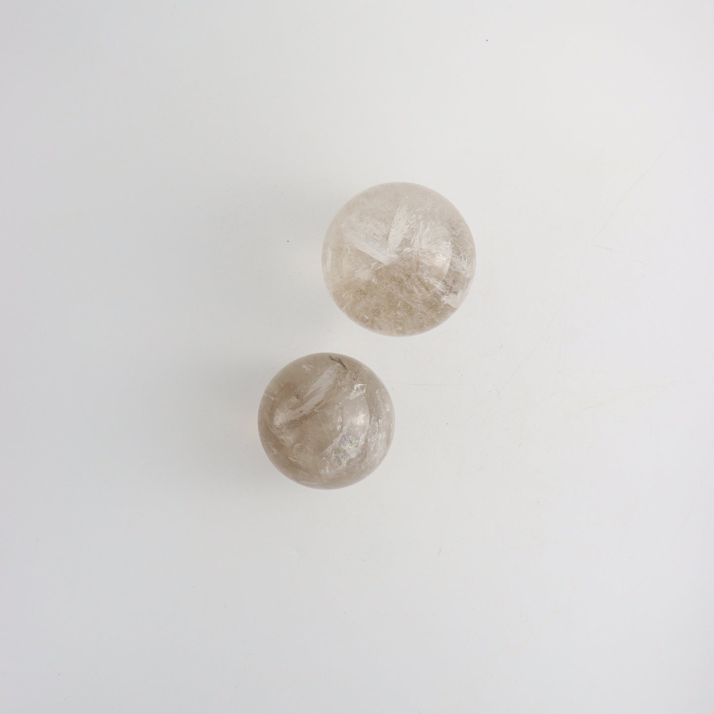 Smoky and Clear Quartz Spheres - Expert Wholesale and Supplier of Wholesale Crystals & Bulk Gemstones, ["Brazil","Clear Quartz","Quartz","Smoky Quartz","Spheres"]