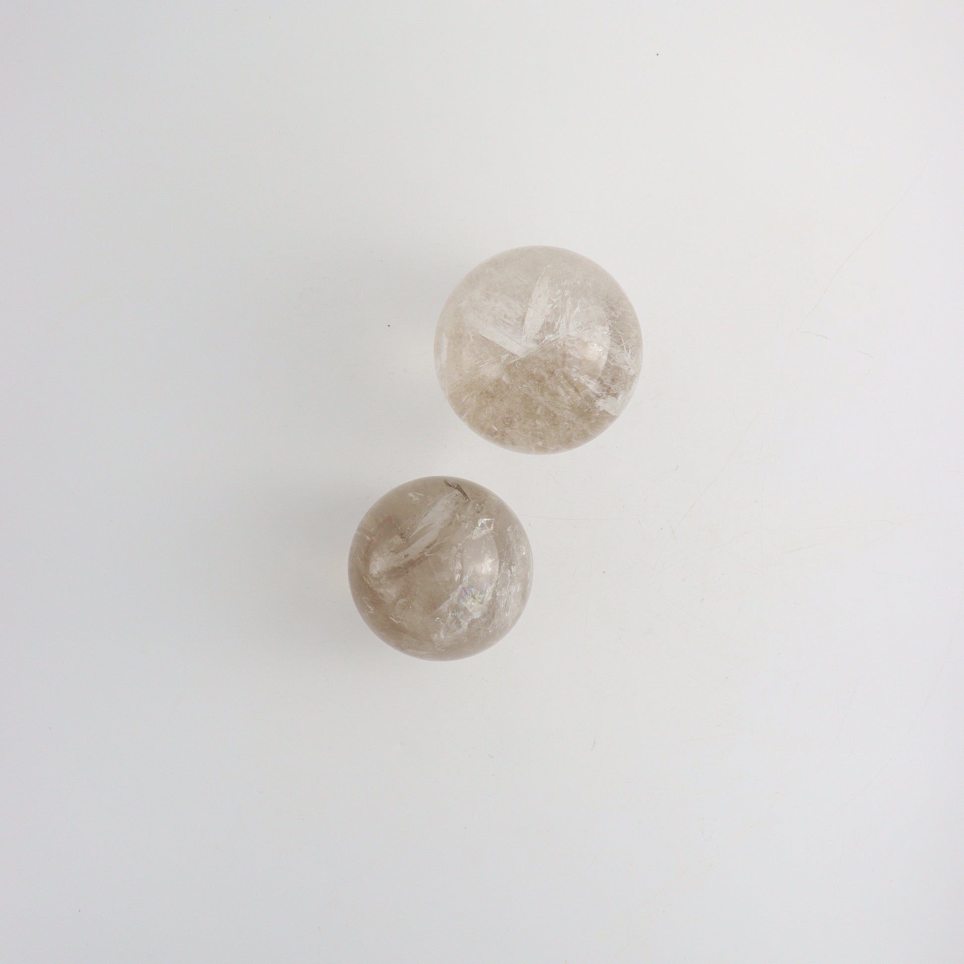 Smoky and Clear Quartz Spheres - Expert Wholesale and Supplier of Wholesale Crystals & Bulk Gemstones, ["Brazil","Clear Quartz","Quartz","Smoky Quartz","Spheres"]